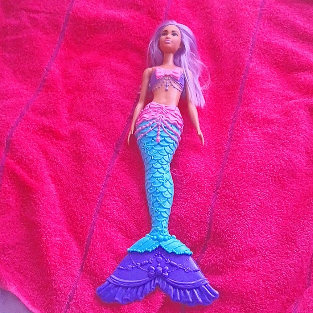 I am selling a mermaid barbie doll
